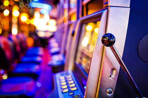 Roulette table with betting layout and live dealer overseeing the wheel